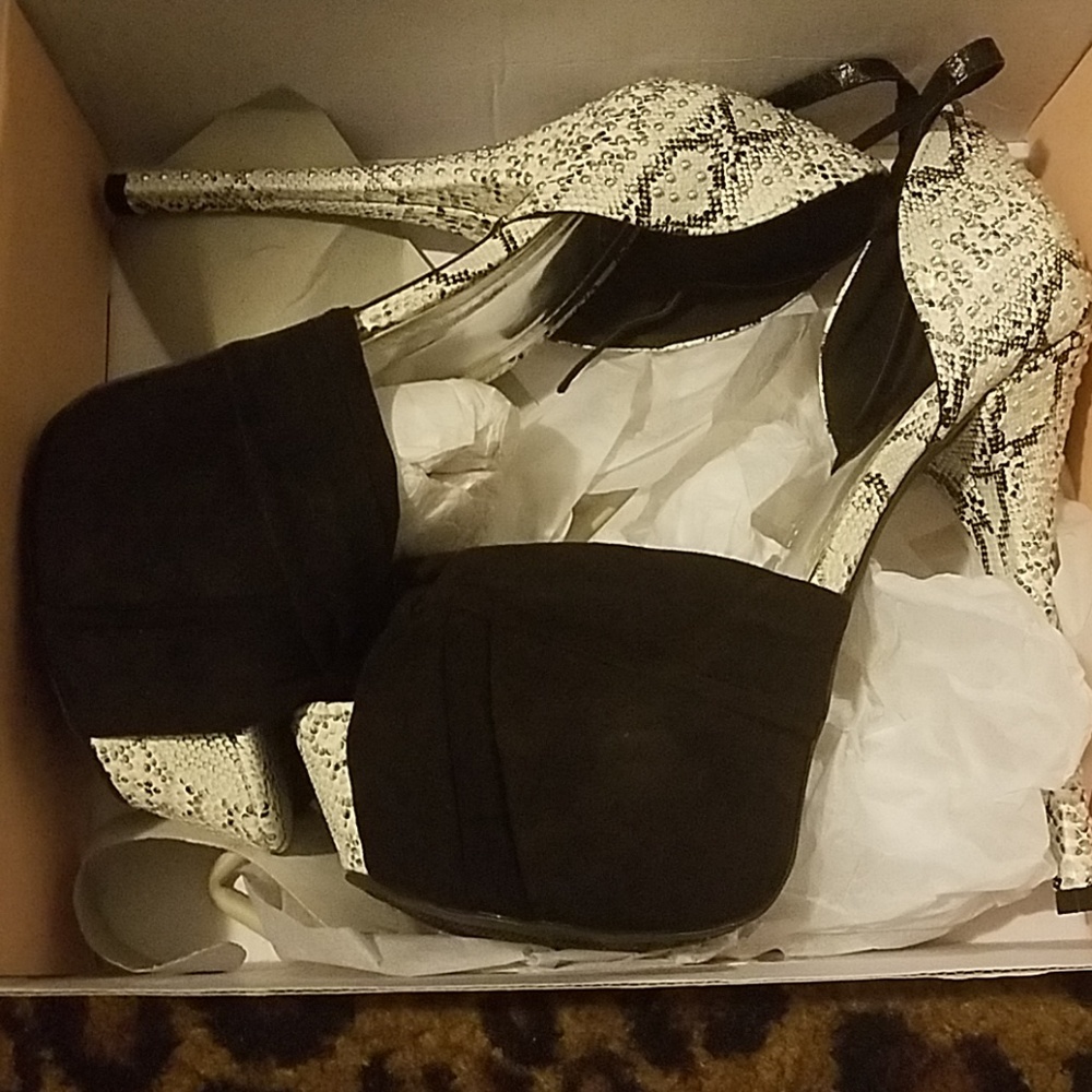 Barely worn Black seude with beaded heels